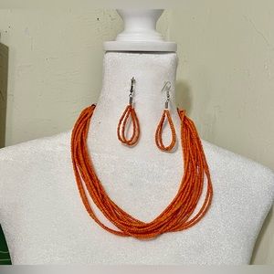 Beautiful Orange stranded beaded necklace with earrings